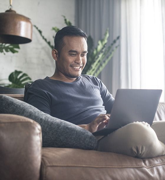 Man looking at laptop