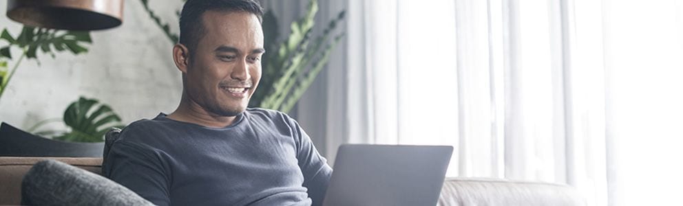 Man looking at laptop