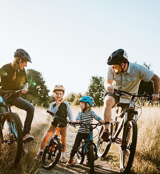 Family riding bikes