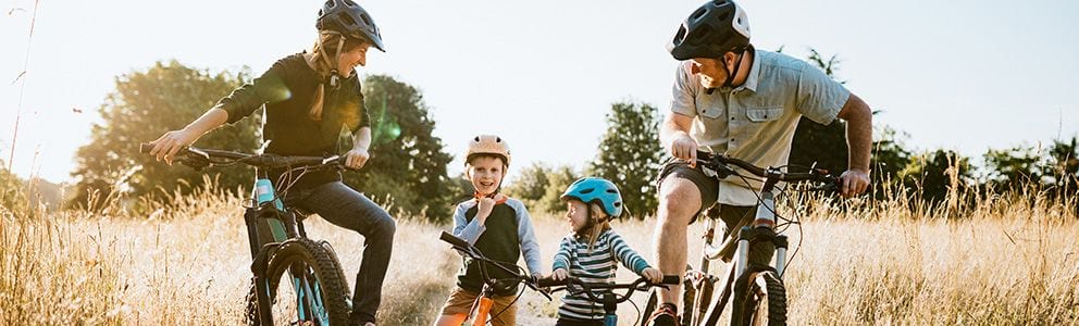 Family riding bikes