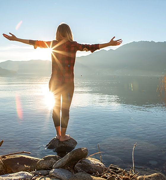 Woman standing in a river