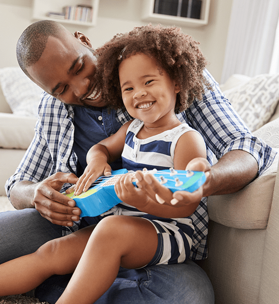 Father and daughter laughing