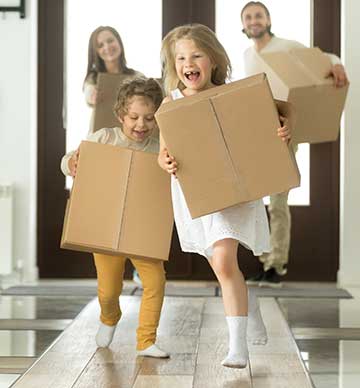 Kids laughing with boxes