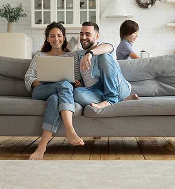 Couple looking at laptop