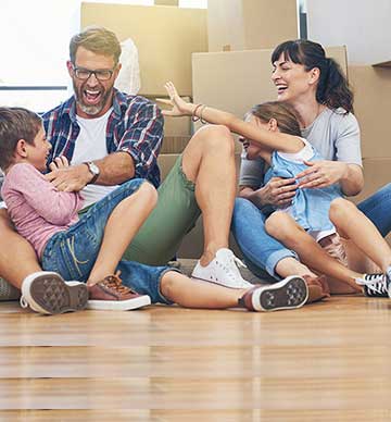 Family with moving boxes