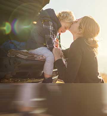 Woman and child in car