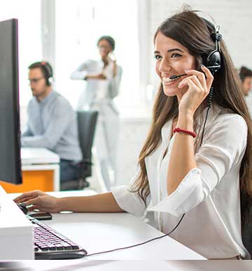 Woman wearing headset and smiling