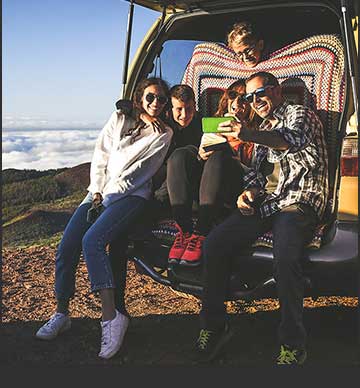 Family sitting in car